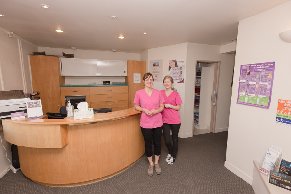 QE2 Dental reception area with front desk and waiting area